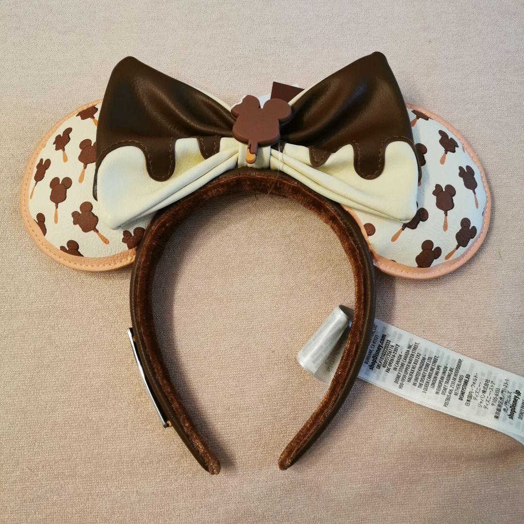 ディズニー カチューシャ ラウンジフライ チョコレート - メルカリ